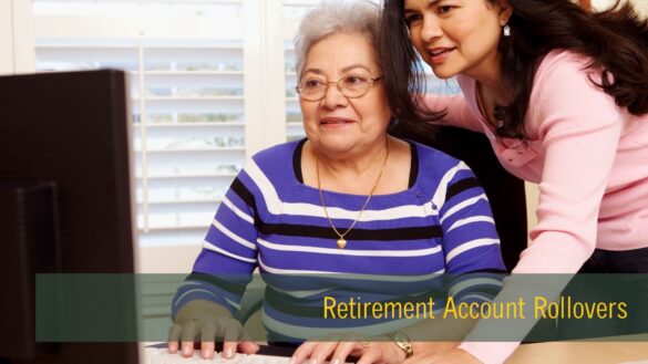 RetirementRollovers_Update Woman helping elderly woman with retirement account rollovers